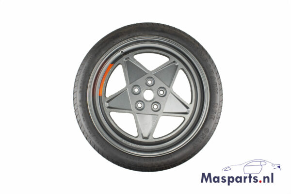 A new Ferrari spare wheel with part number 136861.